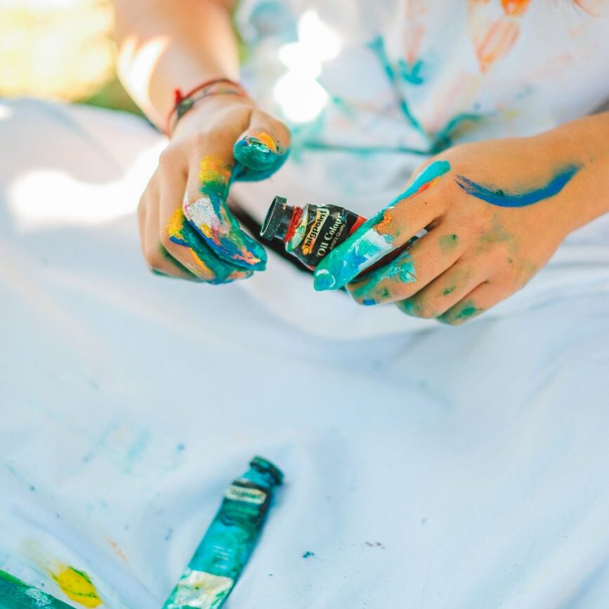 ozdobnik girl playing with paint